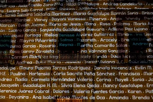 During a protest led by family members of femicide victims, the names of murdered women are projected on the National Palace. 