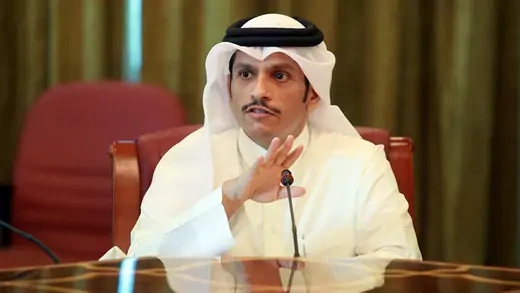 Foreign Minister Sheikh Mohammed bin Abdulrahman Al Thani speaking at a table.