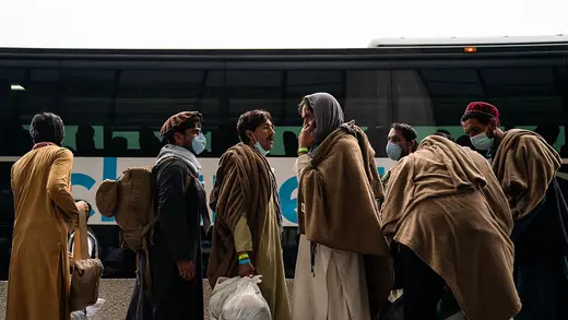 Evacuees airlifted from Afghanistan wait at Dulles International Airport near Washington, DC, in August 2021.