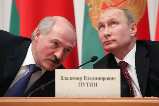 Belarusian President Alexander Lukashenko (L) and Russian President Vladimir Putin attend a meeting October 24, 2013 in Minsk, Belarus.