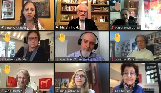 Farah Stockman and Martin S. Indyk speak at a virtual roundtable with seven other people. Four hands are raised.