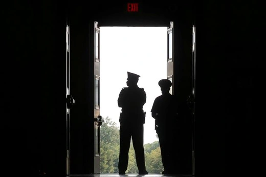 U.S. Capitol Police officers look down from the Rotunda door as members of Congress gather for a September 11th commemoration at the U.S. Capitol in Washington, U.S. September 13, 2021