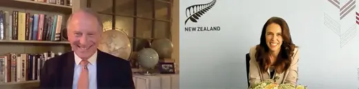 Richard Haass, in a dark suit, speaks with Jacinda Ardern, in a beige jacket, via video chat.