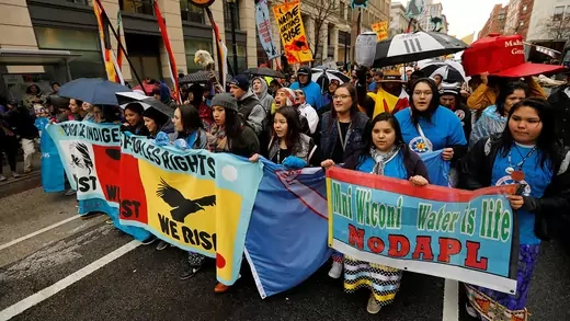 Members of the Standing Rock Sioux Tribe and Indigenous leaders participate in a March 2017 protest in Washington, DC, opposing the Dakota Access and Keystone XL pipelines. 