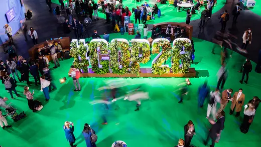 Participants walk around a venue for COP26.