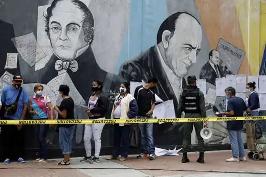 People line up to cast their votes in an election drill ahead of the November regional elections for governors and mayors, in Caracas, Venezuela October 10, 2021.