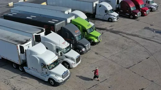 Commercial truck drivers park at the Flying J Truck stop in Breezewood, Pennsylvania in October 2021.