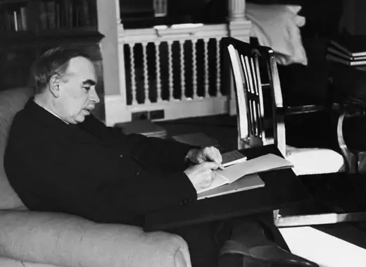 British economist John Maynard Keynes (1883 - 1946) in his study in London