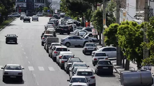 Cars queueing to get gas during an Israeli cyberattack on the country's fuel subsidy network.