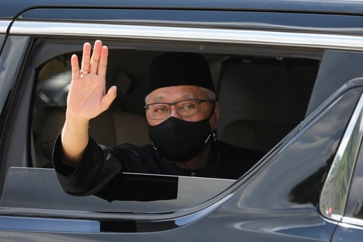 New Malaysian Prime Minister Ismail Sabri Yaakob waves from a car, as he leaves after the inauguration ceremony, in Kuala Lumpur, Malaysia on August 21, 2021.