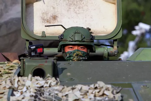 A Taiwanese soldier peers out of a tank during the thirty-seventh annual Han Kuang military exercise in Tainan, Taiwan, on September 14, 2021.