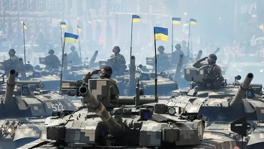 Ukrainian service members drive tanks during the Independence Day military parade in Kyiv, Ukraine in August 2021.