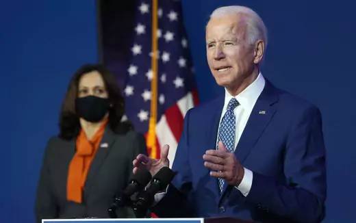 U.S. President-elect Joe Biden speaks to the media while flanked by Vice President-elect Kamala Harris, at the Queen Theater after receiving a briefing from the transition COVID-19 advisory board on November 09, 2020 in Wilmington, Delaware.