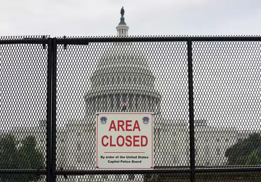 The U.S. Capitol is seen behind fencing that was erected in the wake of the January 6 insurrection, which is expected to be taken down as early as tomorrow in Washington, U.S., July 8, 2021.