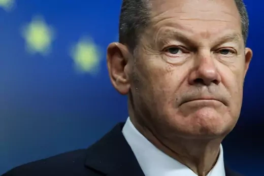 New German Chancellor Olaf Scholz reacts as he speaks during a joint press conference with European Council President, following their meeting, at the EU headquarters, in Brussels, on December 10, 2021.