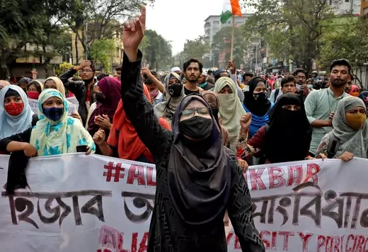 DOCUMENT DATE: February 09, 2022 A Muslim student shouts slogans as she takes part in a protest against the recent hijab ban in few colleges of Karnataka state, in Kolkata, India, February 9, 2022.