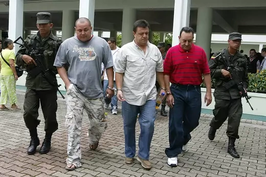 Colombian police arrest three men wanted for extradition by the United States.