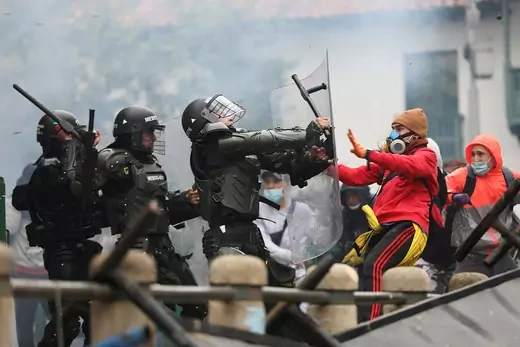 Colombian security forces clash with demonstrators.