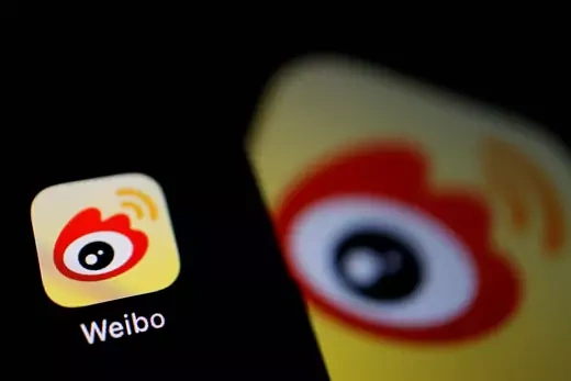 The logo of Chinese social media app Weibo is seen on a mobile phone in this illustration picture