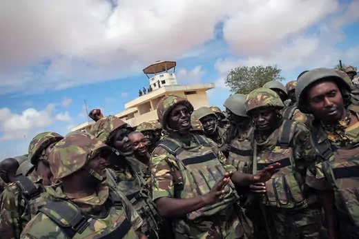 Kenyan soldiers standing in front of airport in Kismayo.