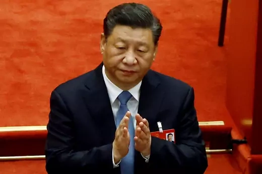 Chinese President Xi Jinping applauds at the opening session of the National People's Congress (NPC) at the Great Hall of the People in Beijing, China, on March 5, 2022.