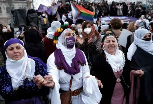 Demonstrators dance during a rally ahead of International Women's Day, in Istanbul, Turkey March 6, 2022.
