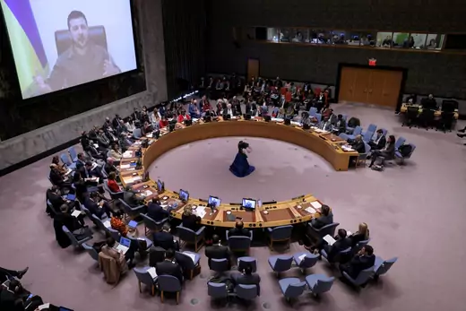 Ukrainian President Volodymyr Zelenskyy appears on a large screen as he addresses the United Nations Security Council via video link during a meeting at the United Nations Headquarters in New York City on April 5, 2022. 