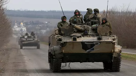 Pro-Russian troops drive two tanks in Mariupol, Ukraine