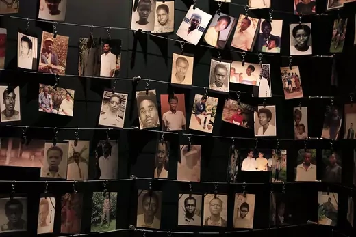 Photographs of people who were killed during the 1994 genocide are seen hanging on strings inside the Kigali Genocide Memorial Museum