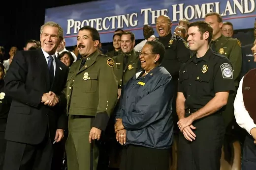 Bush greets U.S. Border Patrol officers at an event promoting the Department of Homeland Security.