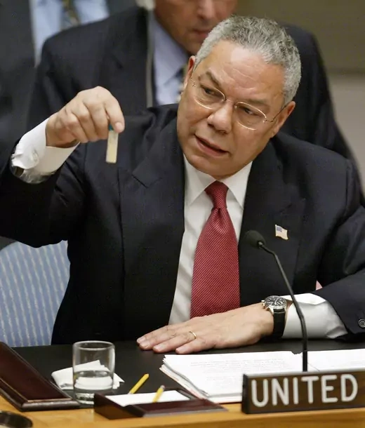 Secretary of State Colin Powell displays a vial like ones that he says Iraq uses to hold anthrax. 