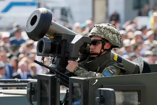 A Ukrainian soldier displays a Javelin anti-tank missile during a military parade.