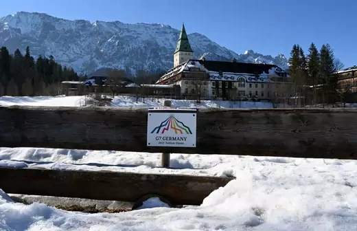 A sign of the former G7 summit of 2015 is seen at a bench in front of the castle hotel Schloss Elmau, pictured in Elmau near Garmisch-Partenkirchen, southern Germany, on March 10, 2022