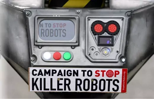 A sign attached to a robot is pictured as activists from the Campaign to Stop Killer Robots, a coalition of non-governmental organisations opposing lethal autonomous weapons or so-called 'killer robots', stage a protest at Brandenburg Gate in Berlin.