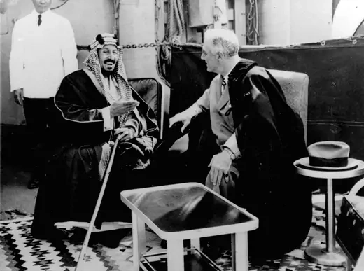 U.S. President Franklin D. Roosevelt and King Abdul Aziz Ibn Saud in discussion aboard the USS Quincy north of Suez, Egypt, in 1945.