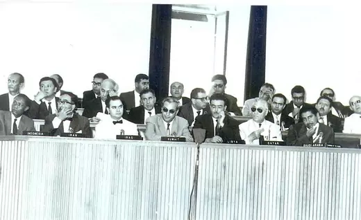 OPEC members are seen sitting at a table during conference.