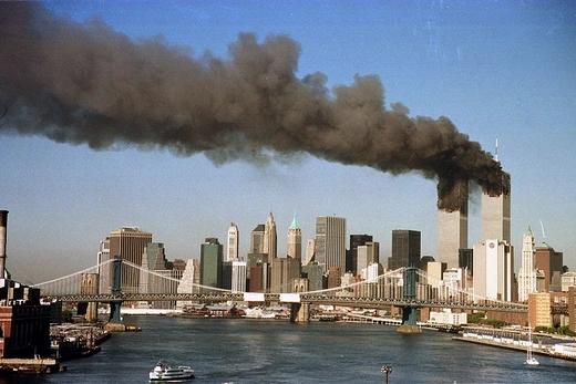 The towers of the World Trade Center billow smoke shortly after being struck by hijacked commercial airplanes in New York in this file photo taken on September 11, 2001. 