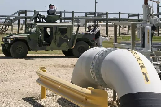 Photo showing a private security contractor in military vehicle patrolling the U.S. Department of Energy’s Strategic Petroleum Reserve in Bryan Mound, Texas.
