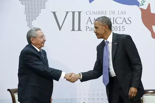 U.S. President Barack Obama shakes hand with Cuban President Raul Castro.