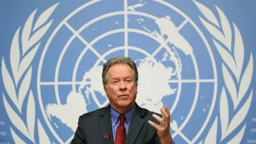 David Beasley speaking in front of the UN logo