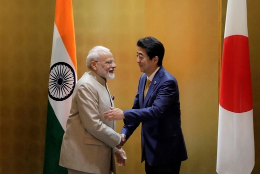 Narendra Modi, India's prime minister, shakes hands with Shinzo Abe, Japan's prime minister, during a bilateral meeting ahead of the G20 summit in Osaka