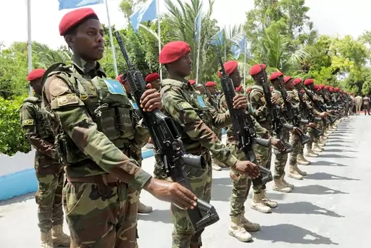Members of Somalia's military officers parade during the handover ceremony of the newly elected President Hassan Sheikh Mohamud
