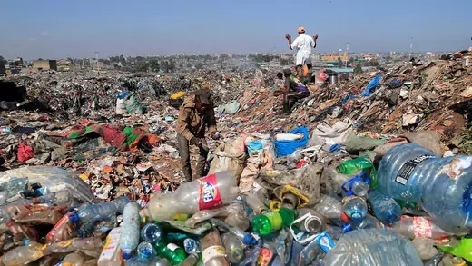 Scavengers sort plastic materials at a dumping site in Nairobi, Kenya.