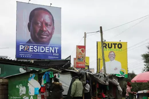 Banners of presidential candidate Raila Odinga of the Declaration of Unity coalition (L) and Deputy President William Ruto and presidential candidate for the United Democratic Alliance and Kenya Kwanza political coalition are seen in Nairobi. 