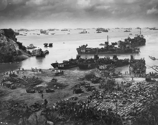 U.S. ships lading on beach at Okinawa.