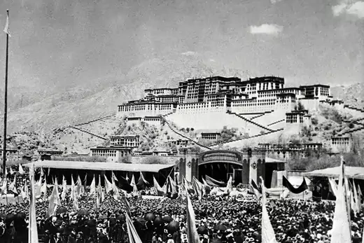 Thousands protest the Chinese occupation of Tibet in front of the Dalai Lama’s palace.