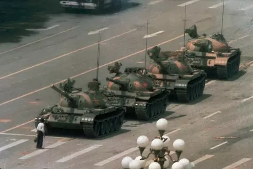 A lone protester confronts military tanks in Tiananmen Square.