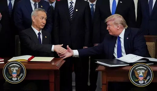Vice Premier Liu He shakes President Donald Trump's hand