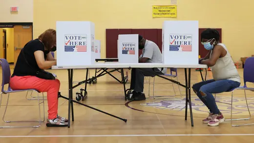 Voters fill out their ballots in St. Louis, Missouri, during a primary election in August 2022. 