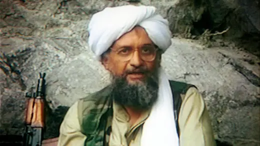 A television screen shows Ayman al-Zawahiri in 2001.